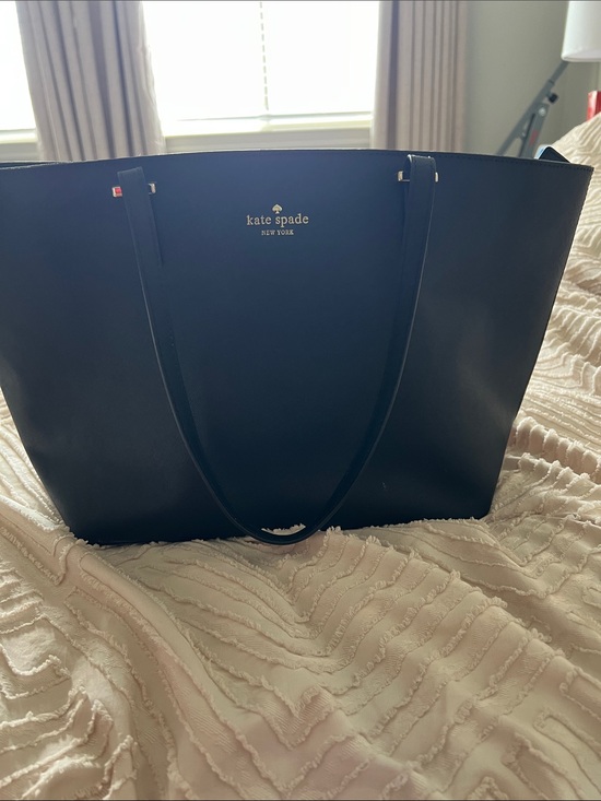 kate spade Handbags - kate spade black leather tote with gold logo